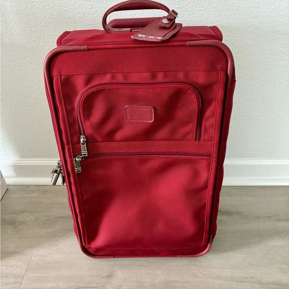 TUMI Elegant Red Travel Suitcase